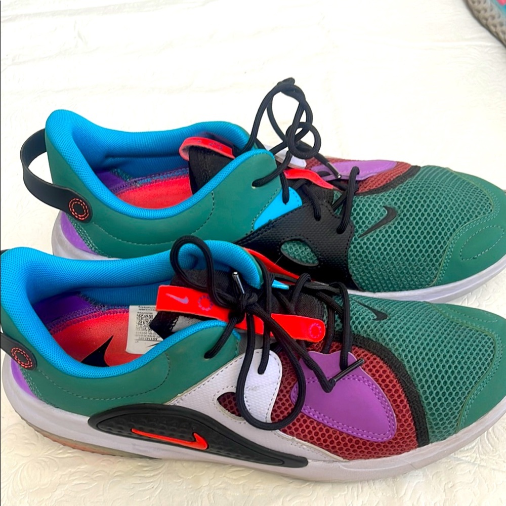 Nike JOYRIDE Green and Purple Sneakers with Dynamic Design